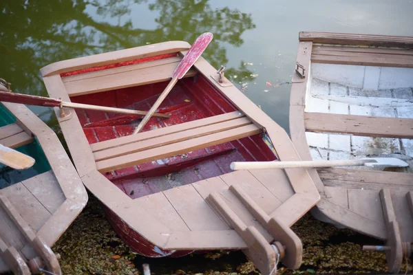 Wooden boat at the lakeside