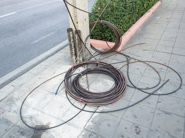 Electric wire pile aside electricity post waiting for set up