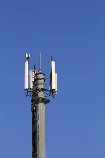 Mobile antenna against blue sky