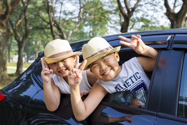 Happy asian kid enjoy summer vacation,  family holiday travel trip with boy together leisure fun