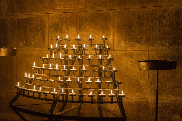 Church candles array in Catholic church