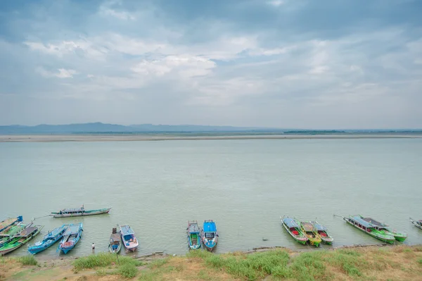 BAGAN, MYANMAR, MAY 4, 2013 : Traders transport foods and products to the market through Irrawaddy river. The river is just few kilometers away from old Bagan, a popular tourist attraction.