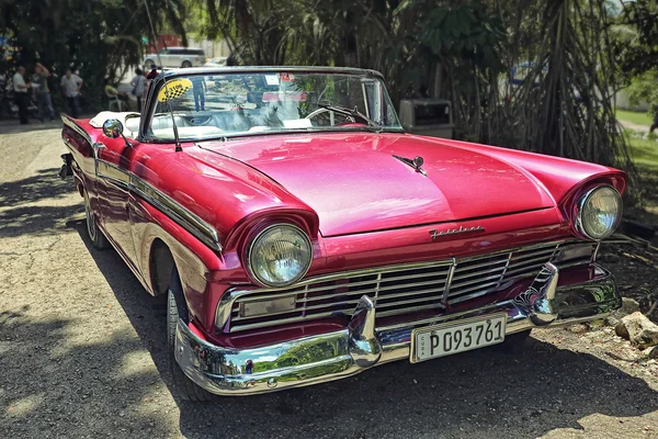 CUBA, HAVANA-JUNE 26, 2015: Classic american car on a street in Havana. Cubans use the retro cars as taxis for tourist