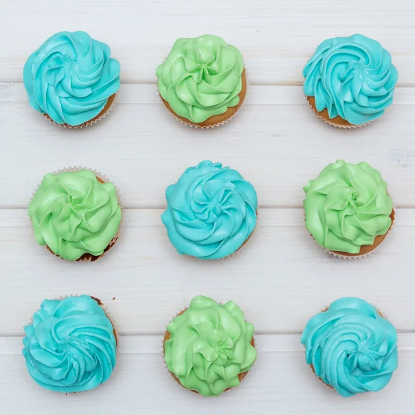 Cupcakes with green and blue cream
