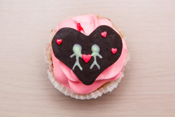 Cupcakes decorated with chocolate hearts