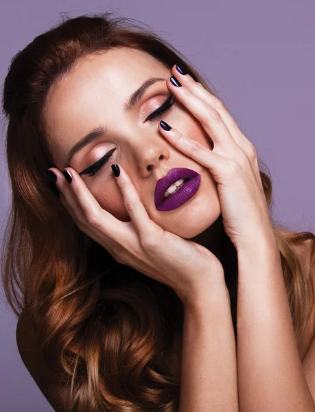 Beautiful woman with violet lips