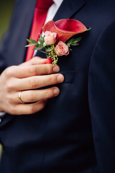 Groom with flower - groom boutonniere