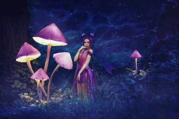 Fairy Coquette standing near the huge mushroom