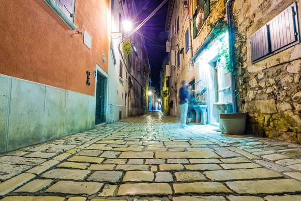 Narrow street in night of old town