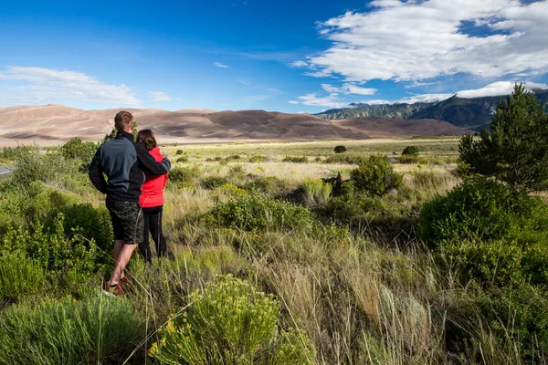 Young couple from back in Great Sand Dunes Park