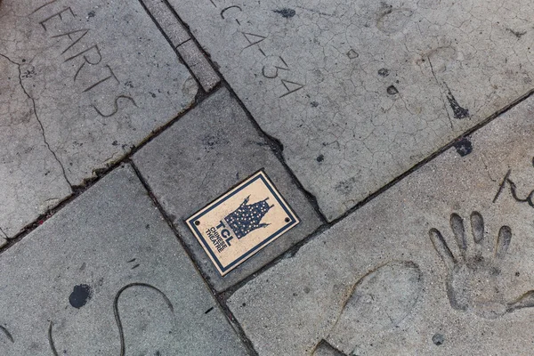 Views of the Walk of Fame and the Buildings at the Hollywood Boulevard