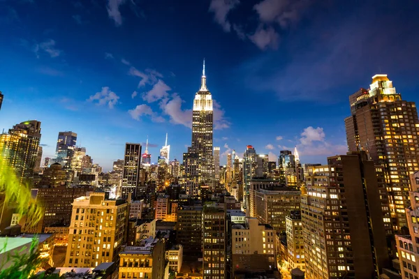 View to Midtown Manhattan with the famous Empire State Building at sunset