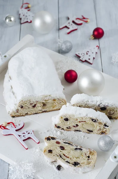 Christmas Stollen with raisins, candied fruit and marzipan