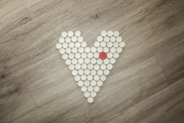 Heart shape made with recycled plastic caps