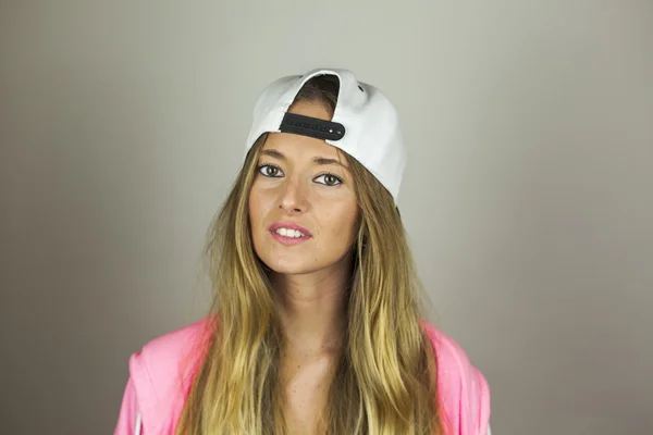 Close up portrait beautiful woman with pink sweatshirt and white