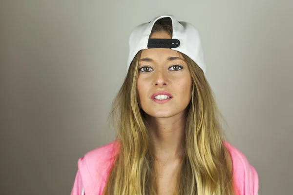 Close up portrait beautiful woman with pink sweatshirt and white