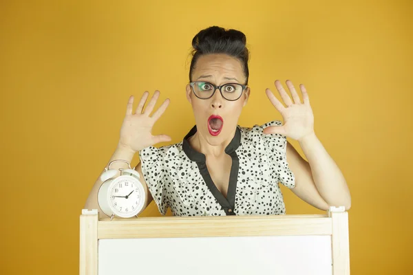 Medium shot pin up girl with whiteboard and white vintage clock