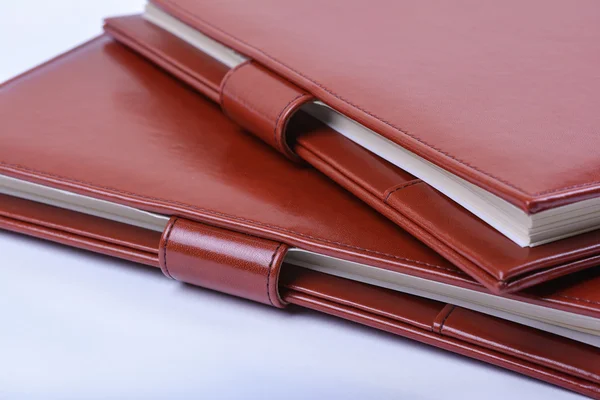 Leather luxury diaries on white background