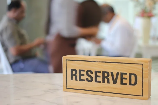 Restaurant reserved table sign on table