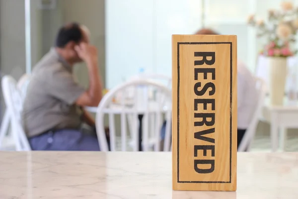 Restaurant reserved table sign on table