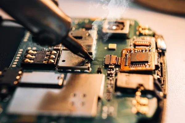 Soldering parts of smartphone