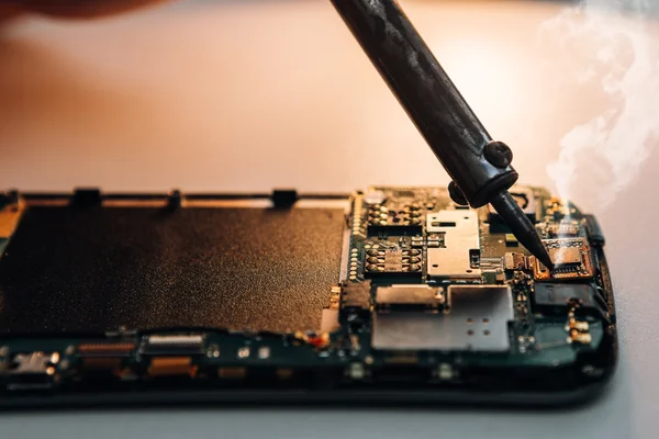 Soldering parts of smartphone