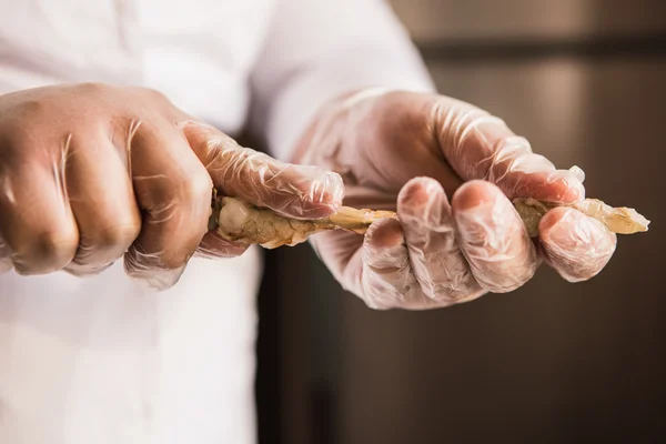 Chef preparing shrimps