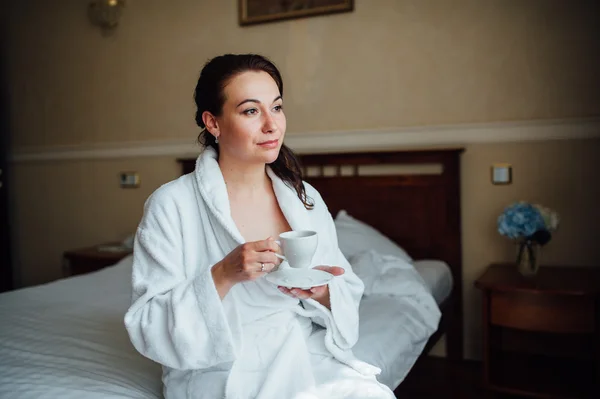 Young woman wearing bath gown