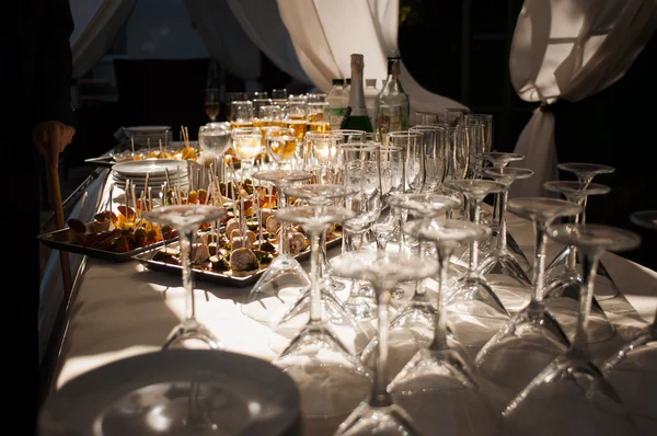 Wedding glasses filled with champagne at the banquet