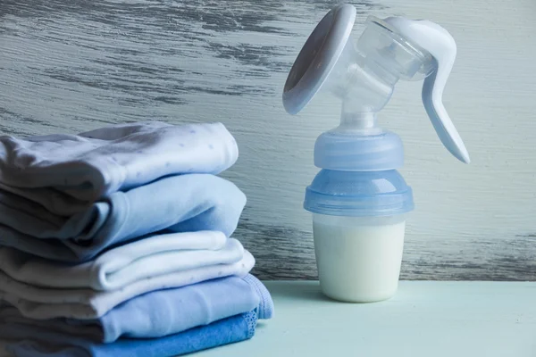 Baby care clothes and  manual  breast pump