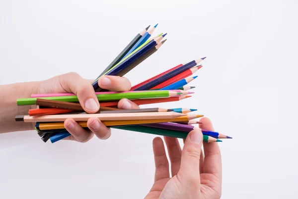 Hand holding Pencils