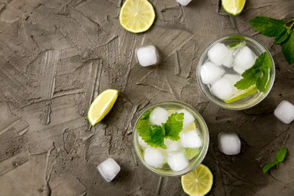 Refreshing summer cocktail with lime and mint.