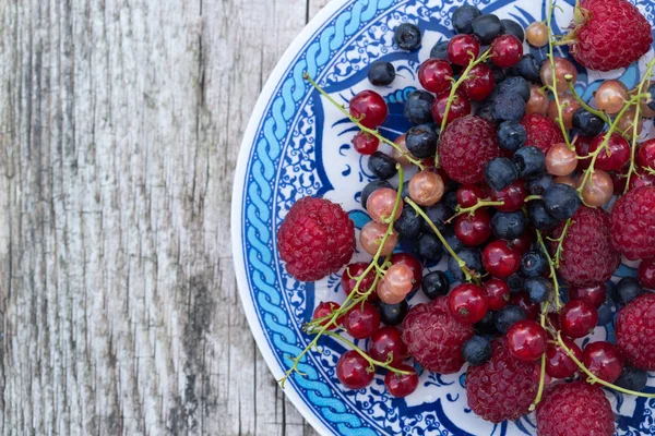 Fresh organic berries. raspberries, blueberries, red currants an