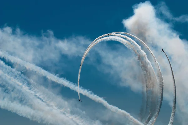 The loop performed by four sports aircraft