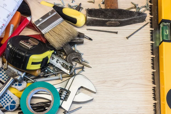 Set of construction tools, the tools lie around, center free, composition power tools.