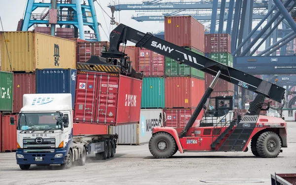 HONG KONG-MAY 10,2016:The container is loaded / unloaded at Kwai Tsing Container Terminals is the main port facilities in the Channel between Kwai Chung and Tsing Yi Island, Hong Kong on MAY 10,2016