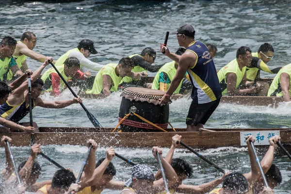 ABERDEEN,HONGKONG,JUNE 6 2016: Boats racing in the Love River for the Dragon Boat Festival in Aberdeen Hongkong