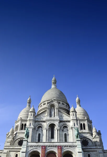 The Basilica of the Sacred Heart of Paris, a Roman Catholic church and minor basilica, located at the summit of the butte Montmartre, the highest point of Paris