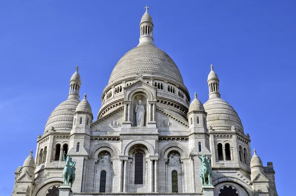 The Basilica of the Sacred Heart of Paris, a Roman Catholic church and minor basilica, located at the summit of the butte Montmartre, the highest point of Paris