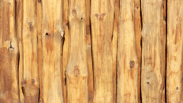 Wooden fence background texture. Closeup wall of wood planks.