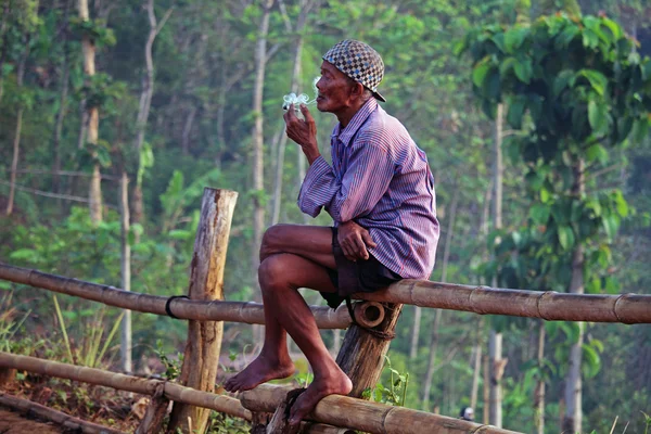 Old man smoking