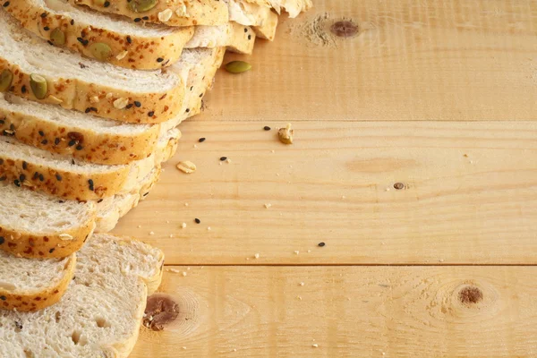 Whole wheat bread on wooden background.copy space