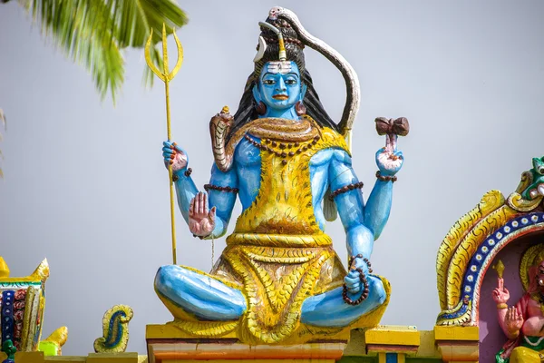 The image of Lord Shiva at the roof of indian hinduism temple