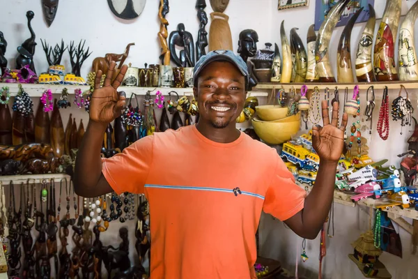 Senegalese seller in his souvenir shop