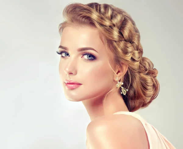 Blond woman with with fashion braid