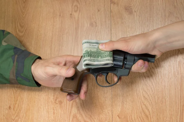 Transfers of money in exchange for a gun under certain condition
