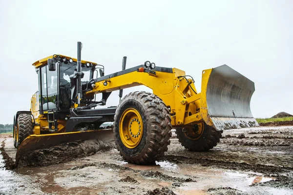 Road grader - heavy earth moving dirty