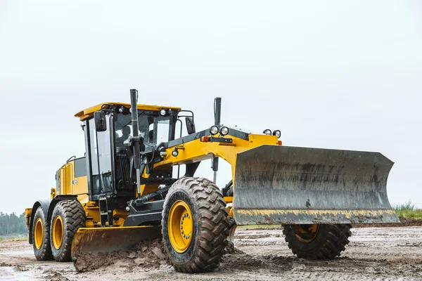 Road grader - heavy earth moving dirty