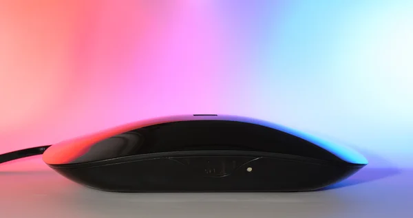Set top box to receive digital television DVB-T and DVB-T2 digital radios. Black finish on a colored background