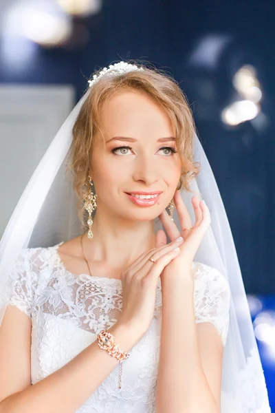 Bride in wedding dress in the blue room